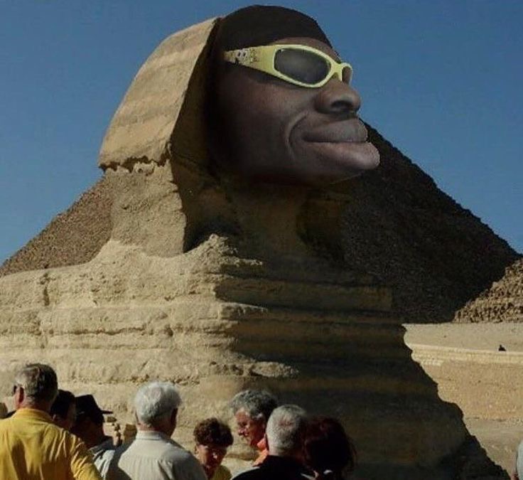 black person wearing glasses pyramid